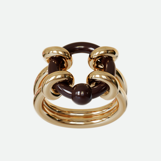 Enamel Captive Ring with a hand-painted enamel O-shaped piercing interlaced within a golden loop, showcasing a striking contrast of materials, designed by Ruggeri.
