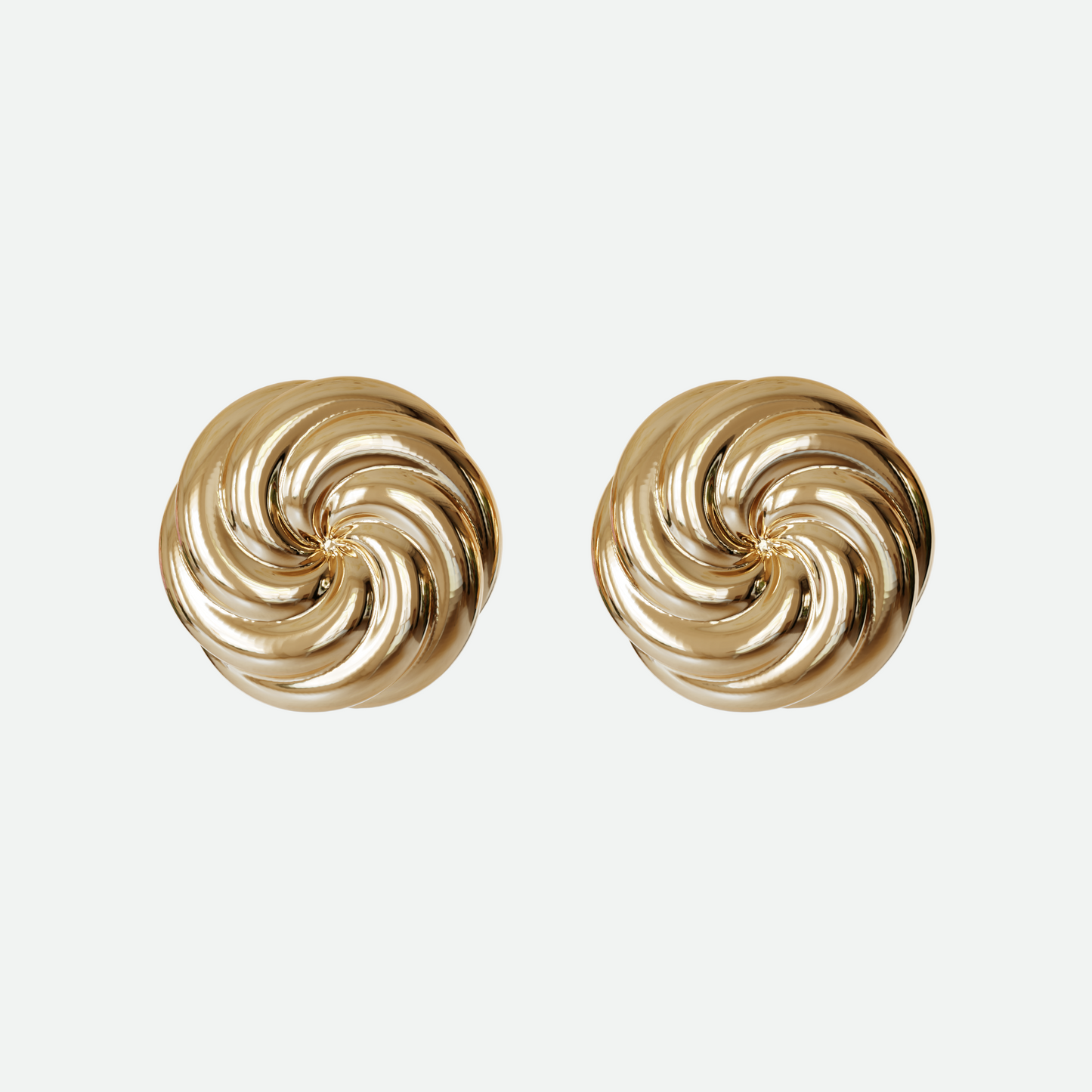 Gold Vortex earring with twin whorls of gold, a beautifully understated design by Ruggeri.