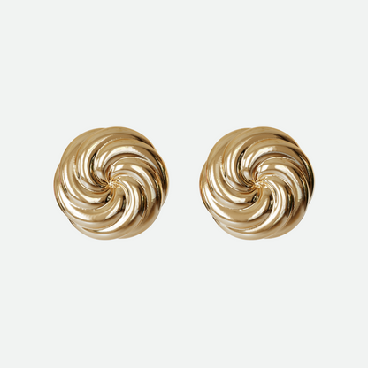 Gold Vortex earring with twin whorls of gold, a beautifully understated design by Ruggeri.