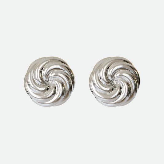 Silver Vortex earring with twin whorls of silver, a beautifully understated design by Ruggeri.