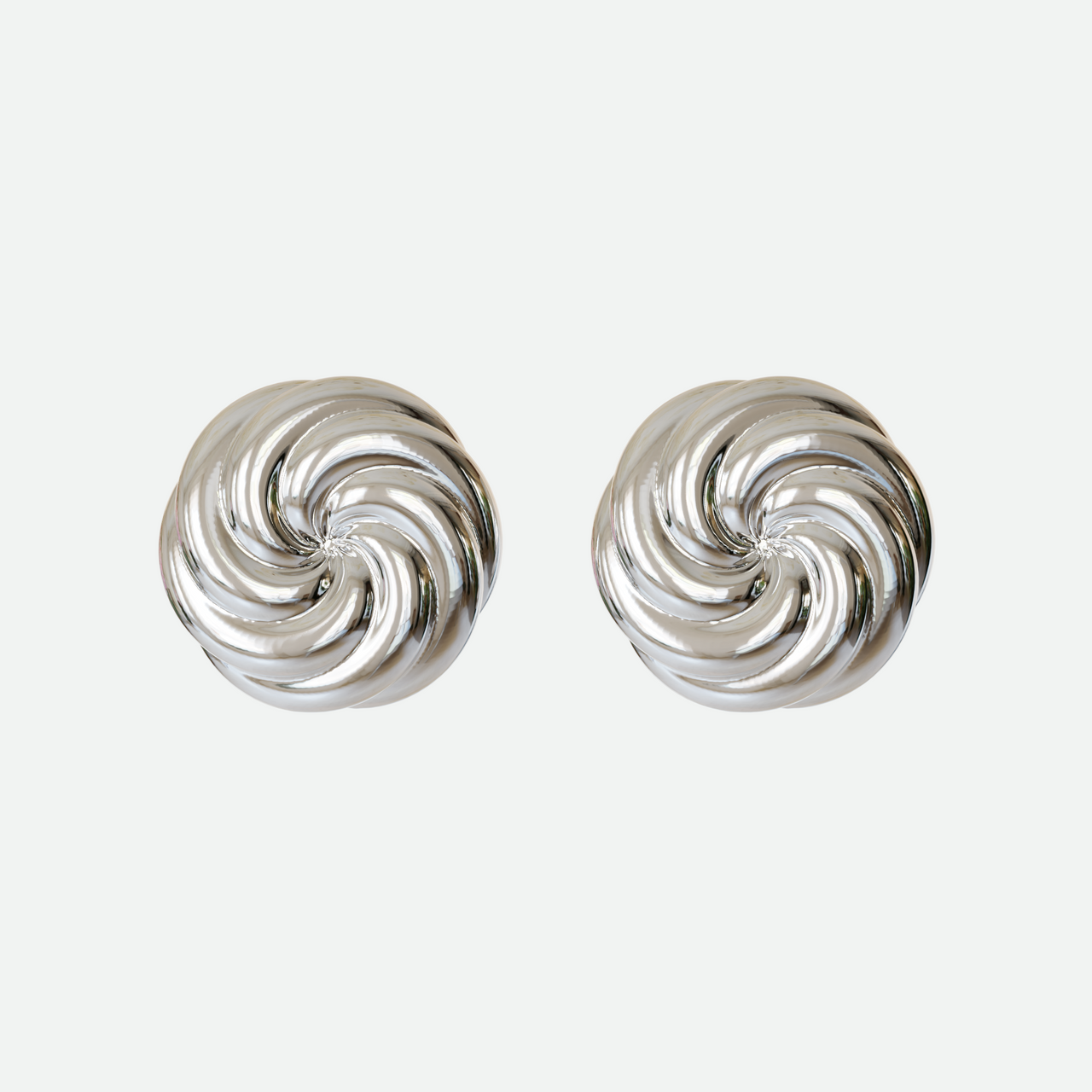 Silver Vortex earring with twin whorls of silver, a beautifully understated design by Ruggeri.