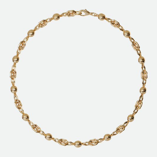 Sphera necklace with custom hexagonal links and smooth pearls of gold, creating a unique interplay of form, designed by Ruggeri.