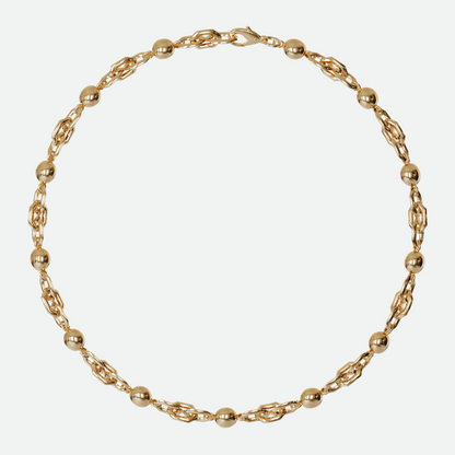 Sphera necklace with custom hexagonal links and smooth pearls of gold, creating a unique interplay of form, designed by Ruggeri.