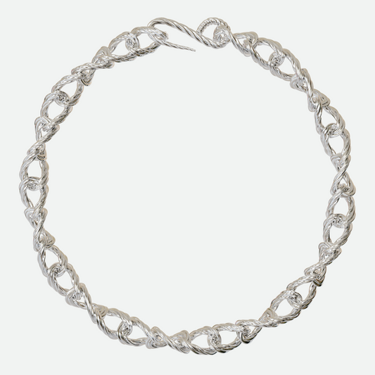 Helix necklace with a signature twisting design in silver, creating a seamless spiralling chain, designed by Ruggeri.