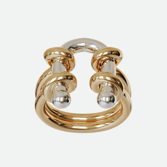 Barbell Ring with a silver U-shaped piercing interlaced within a golden loop, presenting a striking contrast of metals, designed by Ruggeri.