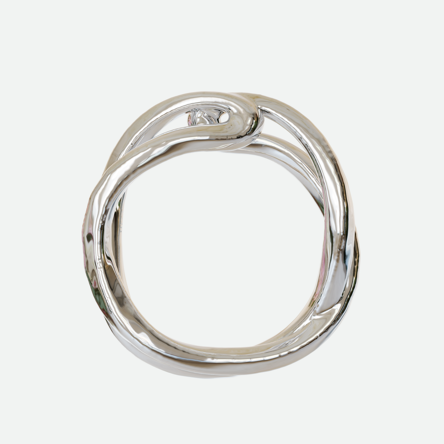 Implico ring in polished silver, where two forms intertwine and touch at the center, showcasing an interplay of shapes, designed by Ruggeri.