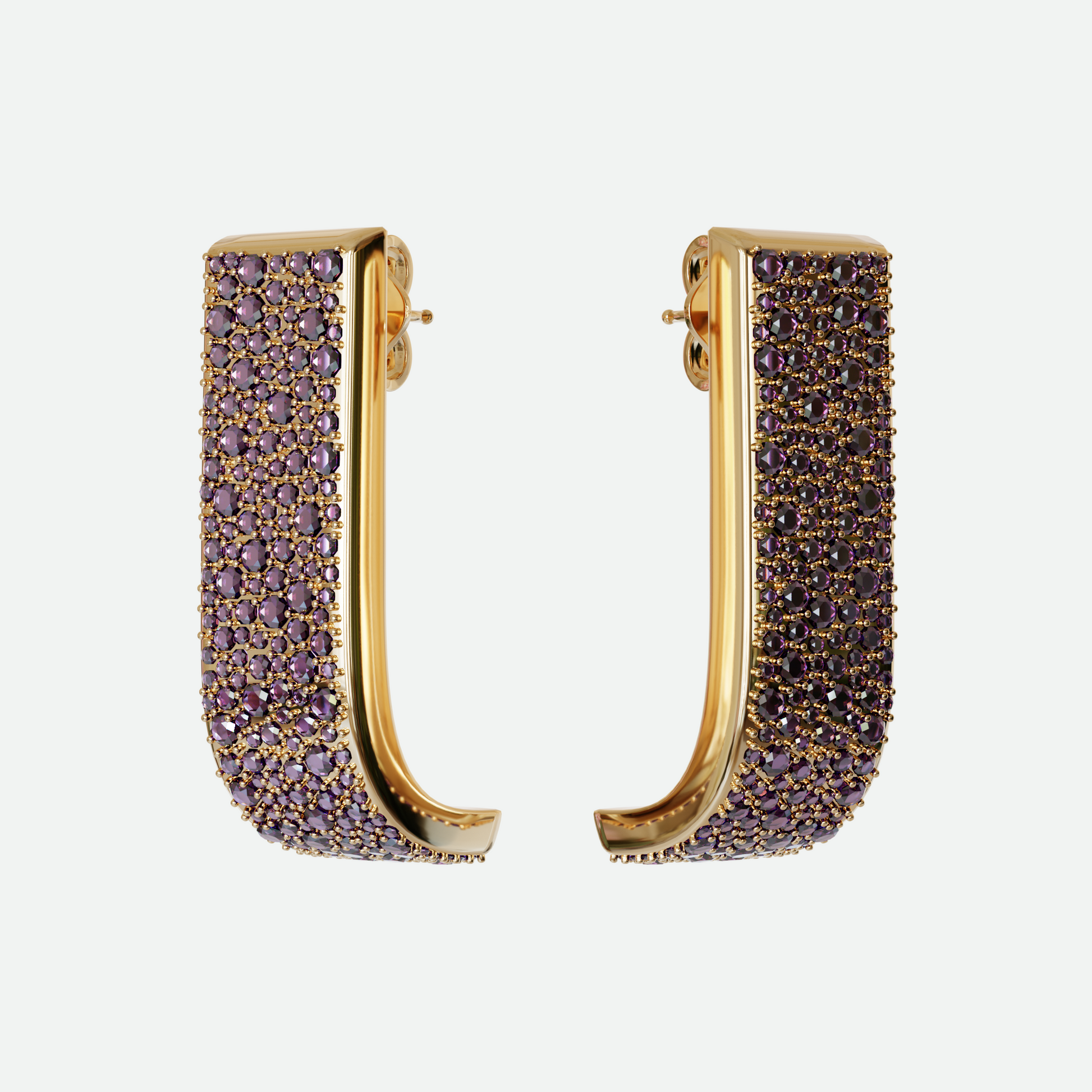 Lucci earrings with amethyst cubic zirconia crystals on a gold plated curving bar, designed by Ruggeri.